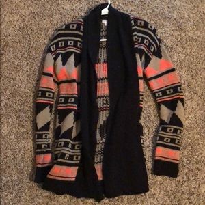 Black, pink, tan cardigan sweater